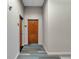 Hallway showcasing multiple doors with carpet at 860 Peachtree Ne St # 2815, Atlanta, GA 30308