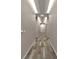 Hallway illuminated with recessed lighting and patterned carpet design at 860 Peachtree Ne St # 2815, Atlanta, GA 30308