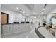 Bright lobby area with a sleek reception desk and art deco accents and comfortable seating at 860 Peachtree Ne St # 2815, Atlanta, GA 30308