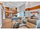 Open lounge area with fireplace, comfortable seating, and bright lighting at 860 Peachtree Ne St # 2815, Atlanta, GA 30308