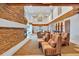 Relaxing lounge with stone fireplace, plush seating, and stylish decor at 860 Peachtree Ne St # 2815, Atlanta, GA 30308