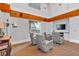Quiet reading room with comfortable swivel chairs, a TV, and a bookshelf at 860 Peachtree Ne St # 2815, Atlanta, GA 30308
