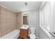 The bathroom is complete with tile accents and good light at 5326 Highway 5, Douglasville, GA 30135