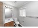 A clean and functional bathroom featuring a vanity, toilet, and modern fixtures at 5326 Highway 5, Douglasville, GA 30135