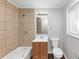 Bathroom featuring a vanity, commode and tiled shower at 5326 Highway 5, Douglasville, GA 30135