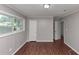 The bedroom includes hardwood floors and neutral walls at 5326 Highway 5, Douglasville, GA 30135
