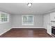 Bright dining room featuring hardwood floors, trim accents, and natural light at 5326 Highway 5, Douglasville, GA 30135