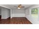 Open living space with beautiful hardwood floors and fresh wall paneling, creating a bright atmosphere at 5326 Highway 5, Douglasville, GA 30135