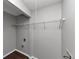 Unfinished walk-in closet with metal shelving and room for organization and storage at 5326 Highway 5, Douglasville, GA 30135