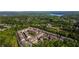 Scenic aerial view of townhomes surrounded by lush green trees, offering a serene and private setting at 265 Trecastle Sq, Canton, GA 30114