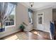 Inviting entryway features gleaming hardwood floors, elegant trim, and abundant natural light at 265 Trecastle Sq, Canton, GA 30114