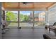 Outdoor porch featuring a seating area, open views of the neighborhood, and wooden ceiling at 265 Trecastle Sq, Canton, GA 30114