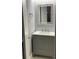 Bathroom featuring a vanity and a decorative mirror at 4828 Westridge Dr, Norcross, GA 30093