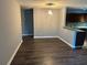 Open dining area with wood floors and modern lighting at 4828 Westridge Dr, Norcross, GA 30093