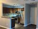 Cozy kitchen features granite countertops, stainless steel appliances, and a stylish backsplash at 4828 Westridge Dr, Norcross, GA 30093