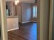 Open concept living space features modern flooring and flows seamlessly into the kitchen at 4828 Westridge Dr, Norcross, GA 30093