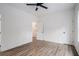 Spacious bedroom with luxury vinyl plank flooring and white doors, creating a clean and modern look at 551 Lake Dr, Atlanta, GA 30354