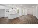 Spacious kitchen with white cabinets, marble backsplash, and an island at 551 Lake Dr, Atlanta, GA 30354