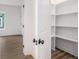 Pantry with ample shelving and storage space at 551 Lake Dr, Atlanta, GA 30354