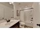 Bathroom featuring modern fixtures, toilet, vanity, and shower-tub combination at 5650 Bergeson Ways, Cumming, GA 30028