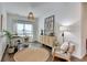 Bright office space with a white desk, natural light, and stylish decor at 5650 Bergeson Ways, Cumming, GA 30028