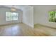 Spacious bedroom with ample natural light and two distinct zones, separated by a divider at 70 Gardenia Nw Dr, Atlanta, GA 30314