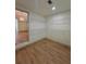 Walk in closet with shelving and new floor at 70 Gardenia Nw Dr, Atlanta, GA 30314