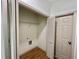 Open closet with metal shelving, wood flooring and an electrical outlet at 70 Gardenia Nw Dr, Atlanta, GA 30314