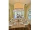 Dining area view showcases seating and bright living room at 70 Gardenia Nw Dr, Atlanta, GA 30314