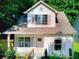 Charming home with well-kept shutters and landscaping at 70 Gardenia Nw Dr, Atlanta, GA 30314