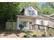 Charming home with a picket fence and landscaped yard offers curb appeal and privacy at 70 Gardenia Nw Dr, Atlanta, GA 30314