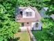 Charming two-story home with manicured landscaping and a welcoming front entrance at 70 Gardenia Nw Dr, Atlanta, GA 30314