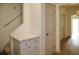 Hallway with a stairway and small built-in storage space at 70 Gardenia Nw Dr, Atlanta, GA 30314