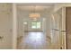 View of the living room highlighting open space, lots of light, and stainless steel fridge at 70 Gardenia Nw Dr, Atlanta, GA 30314
