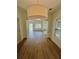 Bright open-concept living area with sliding patio doors, hardwood flooring and a light neutral paint at 70 Gardenia Nw Dr, Atlanta, GA 30314