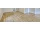 Bright and airy living room with wood-look floors and multiple doorways at 70 Gardenia Nw Dr, Atlanta, GA 30314