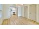 Bright living room features modern lighting, neutral paint and flooring, and connects to the kitchen area at 70 Gardenia Nw Dr, Atlanta, GA 30314