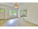Bright living area with sliding glass doors to patio at 70 Gardenia Nw Dr, Atlanta, GA 30314