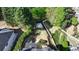 Aerial view of backyard with privacy fence and seating area at 5420 Avonshire Ln, Cumming, GA 30040
