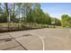 View of community basketball court with two hoops and court markings at 5420 Avonshire Ln, Cumming, GA 30040