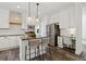Well-designed kitchen offering an island, stainless appliances, and ample cabinet space, with a convenient work area at 5420 Avonshire Ln, Cumming, GA 30040