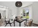 Bright home office featuring modern lighting, natural light, and a neutral color palette at 5420 Avonshire Ln, Cumming, GA 30040