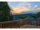 Enjoy breathtaking sunset views from the expansive wooden deck at 5420 Avonshire Ln, Cumming, GA 30040