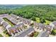 Scenic aerial view of community amidst lush greenery and tree-lined streets at 3505 Chattahoochee Summit Se Ln # 25, Atlanta, GA 30339