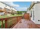 View of a private back deck with wood railing, perfect for outdoor enjoyment and relaxation at 3505 Chattahoochee Summit Se Ln # 25, Atlanta, GA 30339