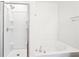 Bathroom with an enclosed shower and a separate soaking tub at 3505 Chattahoochee Summit Se Ln # 25, Atlanta, GA 30339