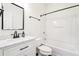Bathroom with a bathtub, a white vanity with a mirror, and black hardware at 3505 Chattahoochee Summit Se Ln # 25, Atlanta, GA 30339
