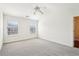 Large bedroom featuring a vaulted ceiling, ceiling fan, and two bright windows for an airy, comfortable space at 3505 Chattahoochee Summit Se Ln # 25, Atlanta, GA 30339
