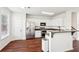 Modern kitchen featuring white cabinets, stainless steel appliances, and ample countertop space at 3505 Chattahoochee Summit Se Ln # 25, Atlanta, GA 30339