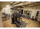 Fully equipped fitness center with weights, machines, and mirrors at 20 Marietta St. Nw #12D, Atlanta, GA 30303